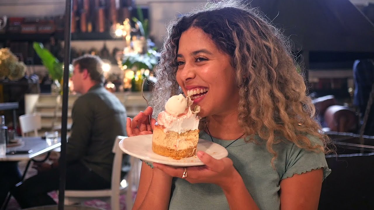 Happy person holding a decorated cake – top 10 best cakes in the world